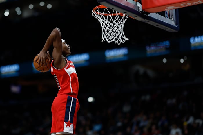 Washington Wizards guard Bilal Coulibaly (0) dunks the ball against the Milwaukee Bucks in the second quarter at Capital One Arena.